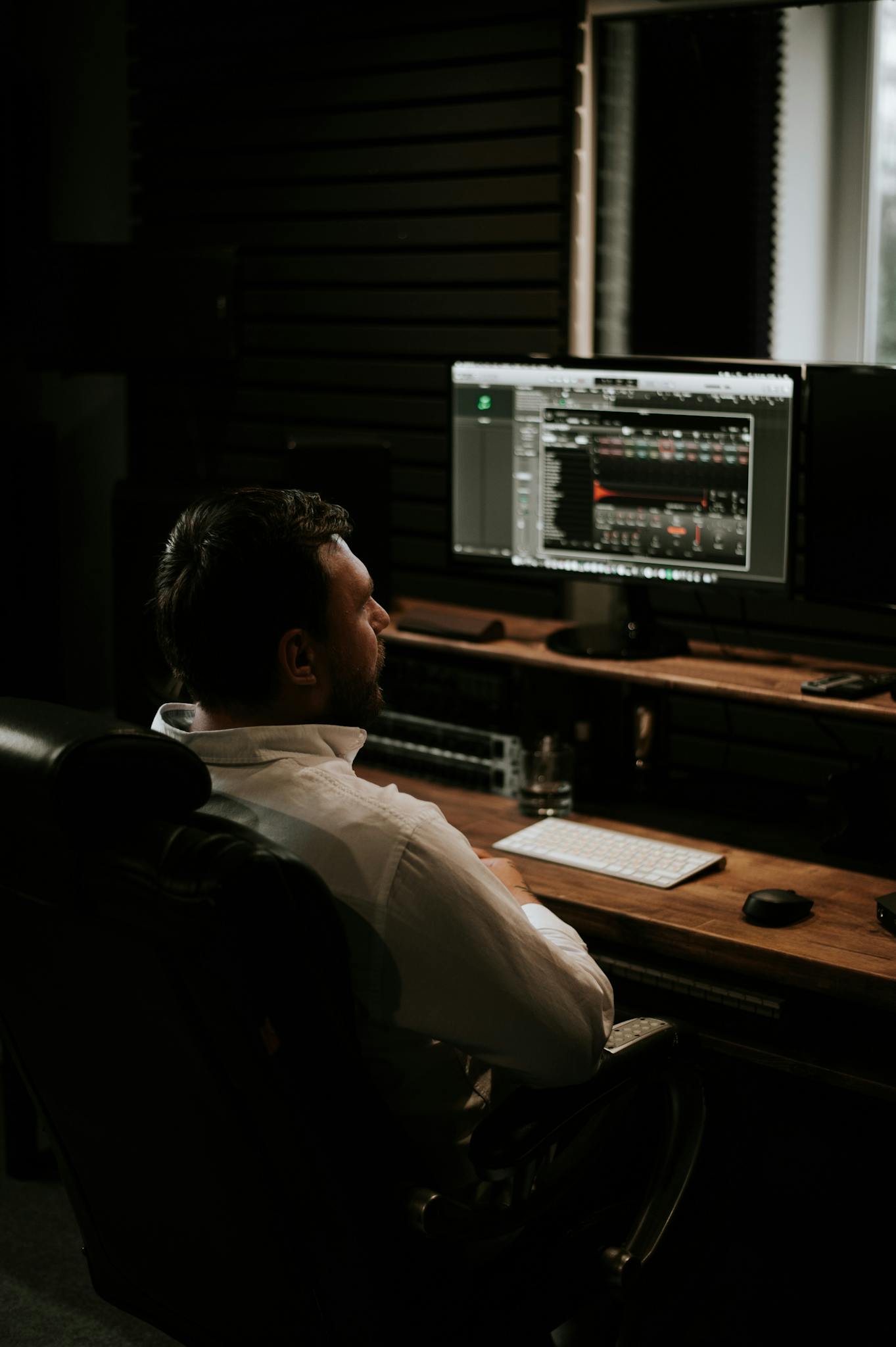 A Man Looking at Office Equipment 